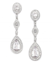 Refined glamour. Eliot Danori's dazzling drop earrings will catch the light with round, pear, and marquise-cut cubic zirconias (10-7/8 ct. t.w.) set in silver tone mixed metal. Approximate drop: 2-1/8 inches.