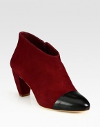 EXCLUSIVELY AT SAKS IN SIENNA. Velvety nubuck leather design has a convenient side zipper and contrasting leather toecap. Self-covered heel, 3 (75mm)Nubuck leather and leather upperSide zipperLeather lining and solePadded insoleImportedOUR FIT MODEL RECOMMENDS ordering true size. 