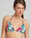 This MARC BY MARC JACOBS triangle bikini top explodes onto the scene with bright tropical blooms.