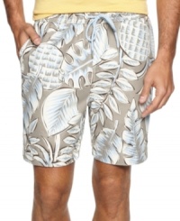 Blend into your tropical surrounding with these floral print swim trunks from Tommy Bahama. Blend into your tropical surrounding with these floral print swim trunks from Tommy Bahama.