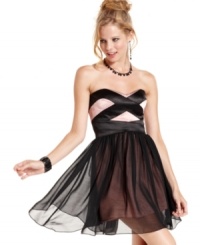 Crisscrossed stripes at the bodice and an overlay of sheer chiffon adds dark magic to a party dress of feminine design! From Hailey Logan. Crisscrossed stripes at the bodice and an overlay of sheer chiffon adds dark magic to a party dress of feminine design! From Hailey Logan.