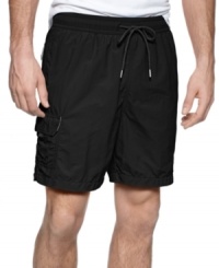 Cool and comfortable, these marine-inspired swim trunks from Tommy Bahama are ready for any warm weather adventure. Cool and comfortable, these marine-inspired swim trunks from Tommy Bahama are ready for any warm weather adventure.