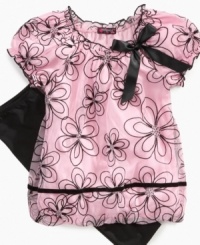 Sweet flower silhouette bubble tunic and solid leggings set by Tempted. Sweet flower silhouette bubble tunic and solid leggings set by Tempted.