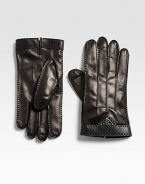 A cold weather favorite, shaped in rich Italian leather with a cashmere lining and a triangular-shaped logo accent.About 10 longCashmere linedLeatherDry cleanMade in Italy