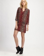 Go bold in vibrant leopard-print silk, styled in an effortlessly-chic tailored shift.Point collarButton frontLong sleeves with button cuffsFlap pockets at hipStraight hemAbout 31 from natural waistSilkDry cleanImportedModel shown is 5'10 (178cm) wearing US size Small.