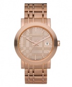 This Burberry watch features a check-inspired rose gold ion-plated stainless steel bracelet and round case. Rose gold tone dial with check pattern features applied stick indices, minute track, date window at three o'clock, three hands and logo. Swiss made. Quartz movement. Water resistant to 50 meters. Two-year limited warranty.