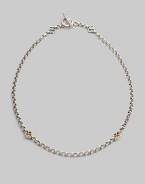 A bold sterling silver chain is accented by cloverleaf shapes of 18k gold in front and sterling silver at the closure. Sterling silver and 18k yellow gold Length, about 18 Toggle closure Made in Greece
