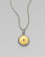 From the Shield Collection. An aptly named disc pendant of hammered 24k gold sits in a richly granulated frame of sterling silver with a faceted black spinel stone at its center.Black spinelSterling silver and 24k yellow goldAdjustable chain length, about 16-18Pendant diameter, about ¾Hook claspImported