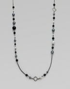 From the Quatrefoil Collection. An extra long sterling silver chain with bead and quatrefoil stations.Black onyx & hematite Sterling silver Can be worn doubled Length, about 48 Lobster clasp closure Imported 