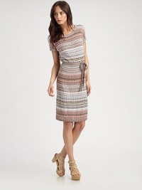 Multicolored stripes add a modern twist to this fine-knit pointelle design with a flattering self tie at the waist. ScoopneckShort sleevesSelf tie at waistAbout 17 from natural waist60% rayon/40% cottonHand washImportedModel shown is 5'10 (177cm) wearing US size Small. Multicolored stripes add a modern twist to this fine-knit pointelle design with a flattering self tie at the waist. ScoopneckShort sleevesSelf tie at waistAbout 17 from natural waist60% rayon/40% cottonHand washImportedModel shown is 5'10 (177cm) wearing US size Small.