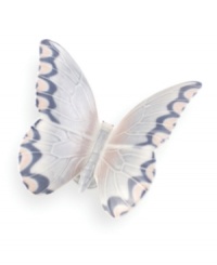The symbol of new birth and natural beauty, this butterfly figurine brings complete grace and wonder to any home. Handcrafted in Spain of pure porcelain. The symbol of new birth and natural beauty, this butterfly figurine brings complete grace and wonder to any home. Handcrafted in Spain of pure porcelain.