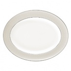 The embodiment of simplicity and grace, platinum bands and pure white stitches with raised dots adorn a pearlescent linen border. Inspired by the silk fabrics in Monique's evening gown designs, pearlized blue and tan accent colors create a look that is both elegant and beautifully serene.