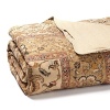 The intricate design of an antique Persian Rug in terracotta, bronze and cream tones inspires this unique Ralph Lauren comforter.