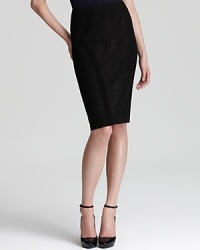Metallic threading lends a subtle touch of glamour to this Donna Karan New York skirt, aligning the streamlined look with fall's hautest theme. Metallic threading lends a subtle touch of glamour to this Donna Karan New York skirt, aligning the streamlined look with fall's hautest theme.