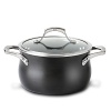 This Calphalon soup pot with lid boasts the revolutionary Unison Slide Nonstick surface which releases foods effortlessly, making even the most demanding culinary creations simple to prepare. A heavy-gauge bottom provides even heating and prevents sauces from scorching, while the high sides and narrow opening control evaporation. Handles stay comfortably cool on the stovetop.