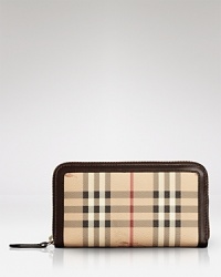 A chic wallet from Burberry in the house's iconic check. A chic wallet from Burberry in the house's iconic check.