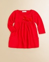 An ultra-soft, ultra-cozy sweater dress gets a fancy update with a gathered waistband and velveteen bow adornment.ScoopneckLong sleevesPullover styleGathered waistFront pocketsRayon/CottonHand washImported