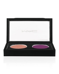A limited edition Dynamic Duo Eye Shadow starring a hot shade of coral and a handsomely rich plum. Just what you need when the lights go back up. A limited edition Dynamic Duo Eye Shadow starring a hot shade of coral and a handsomely rich plum. Just what you need when the lights go back up.