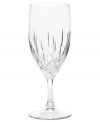 Set a table with enduring appeal. This classically elegant glass features intricately cut facets and graceful lines. Iced beverage shown second from right.