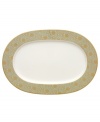 Perfect for casual dining or formal entertaining, this collection features a blend of gilded opulence and sophisticated style. Cheerful flower blossoms float gracefully across white bone china and gold and aqua filigree patterns as this lively set enhances your tabletop.