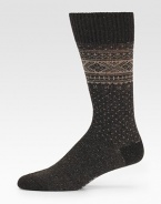 A timeless Nordic pattern is woven with the luxurious touch of merino wool. Ribbed toplineMid-calf height80% merino wool/20% polyamideMachine washMade in Germany