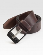 A modern style in smooth leather with a polished logo buckle.LeatherAbout 2½ wideImported