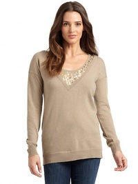 THE LOOKLayered-look design with sequined crewneck trimV-neckLong sleeves Ribbed v-neck, cuffs and hemTHE FITAbout 26 from shoulder to hemTHE MATERIALCashmereCARE & ORIGINDry cleanImportedModel shown is 5'8 (173cm) wearing US size Small. THE LOOKLayered-look design with sequined crewneck trimV-neckLong sleeves Ribbed v-neck, cuffs and hemTHE FITAbout 26 from shoulder to hemTHE MATERIALCashmereCARE & ORIGINDry cleanImportedModel shown is 5'8 (173cm) wearing US size Small.