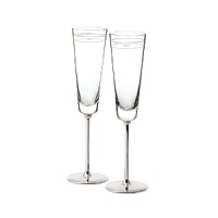 A perfect engagement or bridal shower gift, this set includes two champagne flutes- one etched with MRS and one etched with MR. A perfect engagement or bridal shower gift, this set includes two champagne flutes- one etched with MRS and one etched with MR.