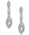 Light as a feather. Eliot Danori's stunning earrings feature an elongated feather shape decorated by sparkling crystals and cubic zirconia (1/2 ct. t.w.). Set in rhodium-plated mixed metal. Approximate drop: 3/4 inch.