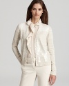 Shimmering sequins lend chic luster to a classic Jones New York Collection cardigan for a luminous approach to layering.