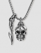 Unique neckwear features a finely detailed skull and Sparta accent in polished sterling silver. Includes 26 chain Skull: ½W X ¾H Sparta accent: ¼W X 1H Made in USA