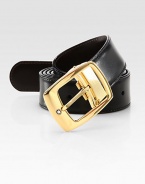 Polished, gold-plated buckle, with logo detail, adorns this reversible leather design.LeatherAbout 1¼ wideMade in Italy