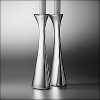One of the most appealing collections from Nambe, the Tri-Corner Bowls, now available in coordinating candlesticks. They both embody Nambé's guiding principles of design: functional objects for the home, of the highest esthetics. Available in 5 or 9H. One of the most appealing collections from Nambe, the Tri-Corner Bowls, now available in coordinating candlesticks. They both embody Nambé's guiding principles of design: functional objects for the home, of the highest esthetics. Available in 5 or 9H.