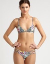 From its lively, multi-colored print to its bohemian-inspired, braided straps, this bikini has it all, including the right amount of stretch for a great fit.Braided strapsTriangle cupsBack clasp closureCriss-cross backBraided sides on stretch bottomFully lined80% nylon/20% spandexHand washMade in USA