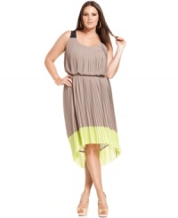 Jessica Simpson's plus size dress is both ladylike and electrifying--a sweet pleated silhouette is amplified with bright contrasting colorblocking and a high-low cut at the hem. Jessica Simpson's plus size dress is both ladylike and electrifying--a sweet pleated silhouette is amplified with bright contrasting colorblocking and a high-low cut at the hem.