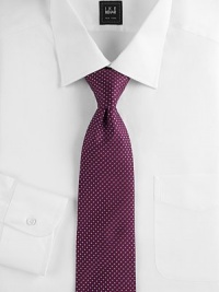 An elegant Italian silk design is finished with tiny dots allover. Silk Dry clean Made in Italy An elegant Italian silk design is finished with tiny dots allover. Silk Dry clean Made in Italy