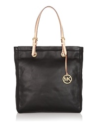 An incomparably chic tote from MICHAEL Michael Kors in luxe pebbled leather. An incomparably chic tote from MICHAEL Michael Kors in luxe pebbled leather.