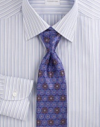 An elegant medallion design crafted in superior silk. Silk Dry clean Made in Italy 