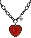 Revel in romance. GUESS's dramatic heart pendant stands out with bright red crystals against a black-plated mixed metal setting and toggle clasp. Approximate length: 18 inches. Approximate drop: 1-1/2 inches.