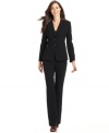 Tahari by ASL's sleek suit features D-ring buckles atop flap pockets for a subtle flourish.