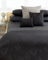 Allover pleats create a linear pattern against a background of rich black silk in this simply modern Calvin Klein decorative pillow. (Clearance)