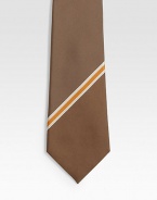 A wardrobe essential in silk made elegant with a diagonal stripe.SilkDry cleanMade in Italy