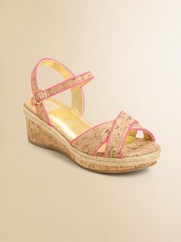 Natural cork-style sandals with criss-cross front straps and an adjustable buckle closure.Buckle closurePolyurethane upperPolyurethane liningSynthetic soleLightly padded insoleImported Natural cork-style sandals with criss-cross front straps and an adjustable buckle closure.Buckle closurePolyurethane upperPolyurethane liningSynthetic soleLightly padded insoleImported