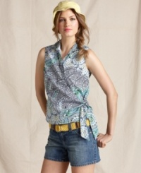 A bright paisley print enlivens the classic silhouette of this crisp wrap top, from Tommy Hilfiger. A bright paisley print enlivens the classic silhouette of this crisp wrap top, from Tommy Hilfiger.