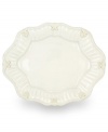 Serve every main course with exquisite taste. Featuring a raised pattern of cascading vines, elegant fluting and a gently scalloped rim, this large oval platter brings distinctly vintage style to the table. Coordinates with Butler's Pantry dinnerware and dishes collection.