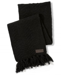Tommy Hilfiger knits up a thick, sturdy yarn into a hefty, herringbone texture to create this season's essential accessory. Tommy Hilfiger knits up a thick, sturdy yarn into a hefty, herringbone texture to create this season's essential accessory.