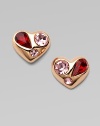 A warm rose goldtone style with colorful rhinestone accents. Rose goldtone brassGlass stonesSize, about ½Post backImported 