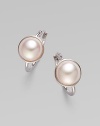 Glistening mabe pearl faceted in sterling silver makes for a timeless design. 10mm mabe pearl Sterling silver Drop, about ½ Ear wire back Made in Spain 