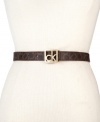 Give your look some signature style with this slender, chic belt from Calvin Klein, featuring the iconic CK logo in a gleaming, golden buckle.