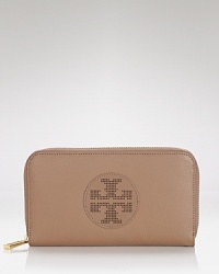 Tory Burch proves practical style can make a statement with this logo-perforated leather wallet, boasting ample slots for your essentials. In your purse or palm, it's as versatile as they come. Tory Burch proves practical style can make a statement with this logo-perforated leather wallet, boasting ample slots for your essentials. In your purse or palm, it's as versatile as they come.
